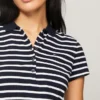 Polo de algodão elástico às riscas com corte justo Polo de algodão elástico às riscas com corte justo