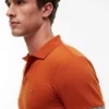 Polo de Algodão Liso com Corte Justo Polo de Algodão Liso com Corte Justo