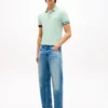 Polo de algodão liso com corte justo Polo de algodão liso com corte justo