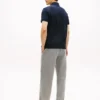 Polo de corte regular com riscas e logótipo Tommy Polo de corte regular com riscas e logótipo Tommy
