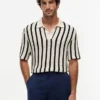 Polo de malha aberta com riscas e corte clássico Polo de malha aberta com riscas e corte clássico