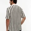 Polo de malha aberta com riscas e corte clássico Polo de malha aberta com riscas e corte clássico