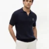 Polo de malha com tranças de manga curta Polo de malha com tranças de manga curta