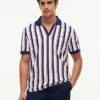 Polo de malha às riscas com corte regular Polo de malha às riscas com corte regular