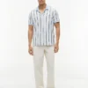 Polo de malha às riscas com corte regular Polo de malha às riscas com corte regular