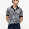 Polo de manga curta com estampado tropical Polo de manga curta com estampado tropical