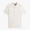 Polo de piqué com bandeira em toda a peça, corte regular Polo de piqué com bandeira em toda a peça, corte regular