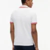 Polo de piqué elástico com riscas em bloco e corte justo Polo de piqué elástico com riscas em bloco e corte justo