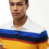 Polo de piqué às riscas com corte regular Polo de piqué às riscas com corte regular