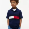 Polo elástico com bandeira em blocos de cor para criança Polo elástico com bandeira em blocos de cor para criança