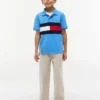 Polo elástico com bandeira em blocos de cor para criança Polo elástico com bandeira em blocos de cor para criança