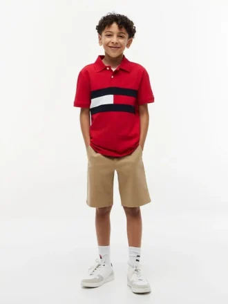 Polo elástico com bandeira em blocos de cor para criança Polo elástico com bandeira em blocos de cor para criança