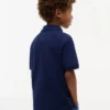 Polo elástico com bandeira em blocos de cor para criança Polo elástico com bandeira em blocos de cor para criança