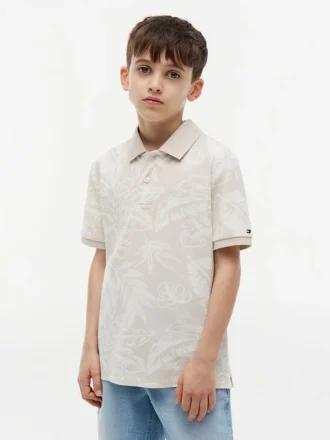Polo elástico com estampado tropical para criança