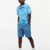 Polo elástico com estampado tropical para criança Polo elástico com estampado tropical para criança