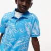 Polo elástico com estampado tropical para criança Polo elástico com estampado tropical para criança