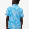 Polo elástico com estampado tropical para criança Polo elástico com estampado tropical para criança