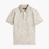 Polo elástico com estampado tropical para criança Polo elástico com estampado tropical para criança
