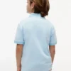 Polo elástico com logótipo em blocos de cor para criança Polo elástico com logótipo em blocos de cor para criança