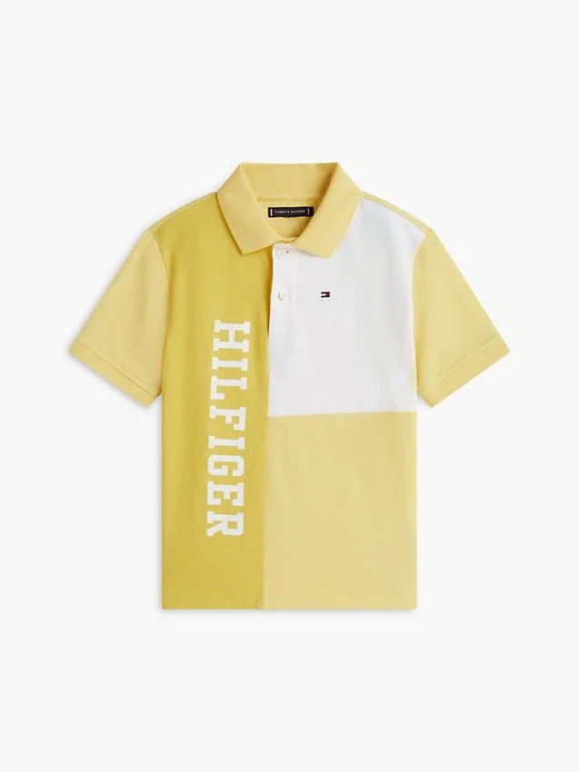 Polo elástico com logótipo em blocos de cor para criança Polo elástico com logótipo em blocos de cor para criança