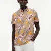 Polo em jersey com estampado floral e corte regular Polo em jersey com estampado floral e corte regular