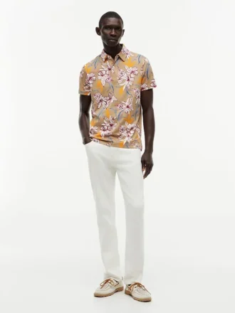Polo em jersey com estampado floral e corte regular