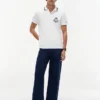 Polo em piqué com monograma e corte regular Polo em piqué com monograma e corte regular