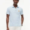 Polo em piqué com monograma em letra cursiva, corte regular Polo em piqué com monograma em letra cursiva, corte regular