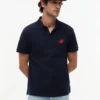 Polo em piqué com monograma em letra cursiva, corte regular Polo em piqué com monograma em letra cursiva, corte regular