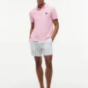 Polo em piqué com monograma em letra cursiva, corte regular Polo em piqué com monograma em letra cursiva, corte regular