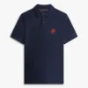 Polo em piqué com monograma em letra cursiva, corte regular Polo em piqué com monograma em letra cursiva, corte regular