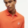 Polo em piqué com monograma em letra cursiva e corte regular Polo em piqué com monograma em letra cursiva e corte regular