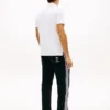 Polo em piqué com monograma em letra cursiva e corte regular Polo em piqué com monograma em letra cursiva e corte regular
