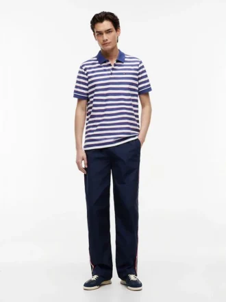 Polo às riscas Tommy Jeans de corte regular
