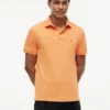 Polo Tommy com corte regular e elástico Polo Tommy com corte regular e elástico