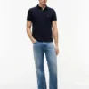 Polo Tommy com corte regular e elástico Polo Tommy com corte regular e elástico