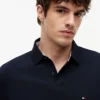 Polo Tommy com corte regular e elástico Polo Tommy com corte regular e elástico