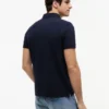 Polo Tommy com corte regular e elástico Polo Tommy com corte regular e elástico