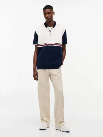 Polo Tommy Jeans Relaxed com fecho de correr de um quarto Polo Tommy Jeans Relaxed com fecho de correr de um quarto