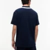 Polo Tommy Jeans Relaxed com fecho de correr de um quarto Polo Tommy Jeans Relaxed com fecho de correr de um quarto