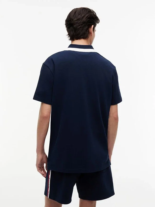 Polo Tommy Jeans Relaxed com fecho de correr de um quarto Polo Tommy Jeans Relaxed com fecho de correr de um quarto