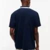 Polo Tommy Jeans Relaxed com fecho de correr de um quarto Polo Tommy Jeans Relaxed com fecho de correr de um quarto