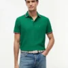 Polo Tommy Wicking de corte regular Polo Tommy Wicking de corte regular