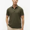 Polo Tommy Wicking de corte regular Polo Tommy Wicking de corte regular