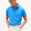Polo Tommy Wicking de corte regular Polo Tommy Wicking de corte regular