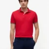 Polo Tommy Wicking de corte regular Polo Tommy Wicking de corte regular