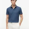 Polo Tommy Wicking de corte regular Polo Tommy Wicking de corte regular
