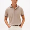 Polo Tommy Wicking de corte regular Polo Tommy Wicking de corte regular