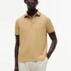 Polo Tommy Wicking de corte regular Polo Tommy Wicking de corte regular