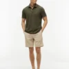 Polo Tommy Wicking de corte regular Polo Tommy Wicking de corte regular